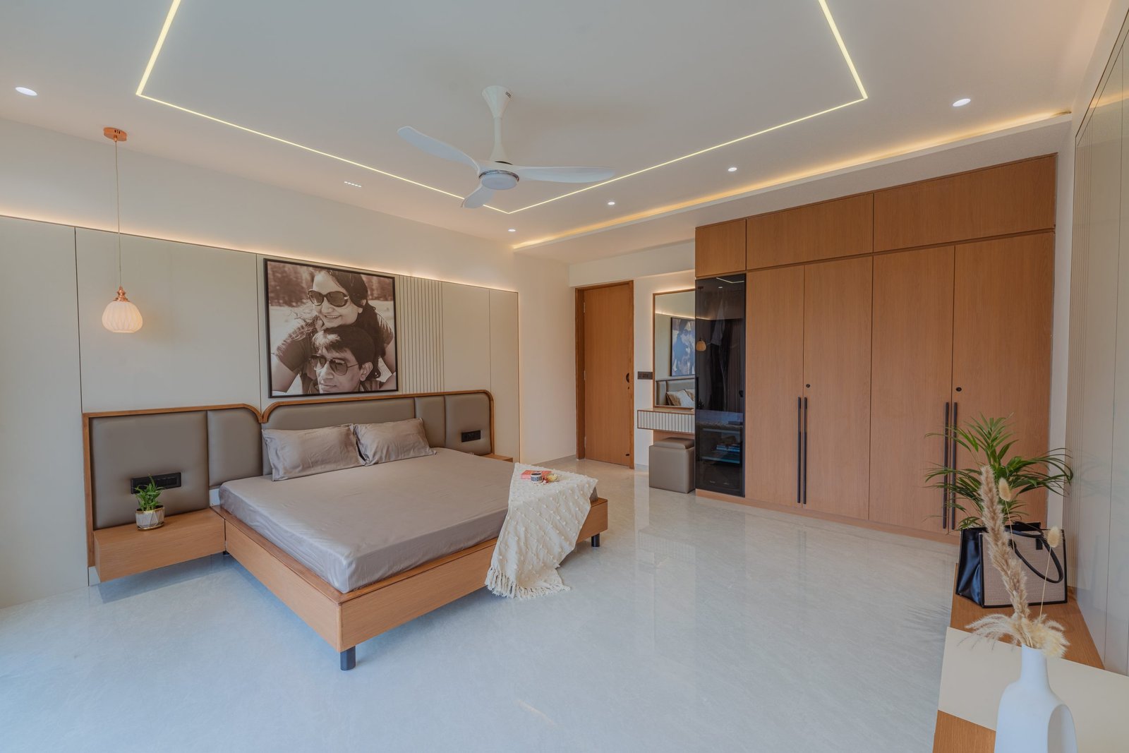 Master bedroom and wardrobe, Jayendra Bhai Residence by Himanshu Raval Architects