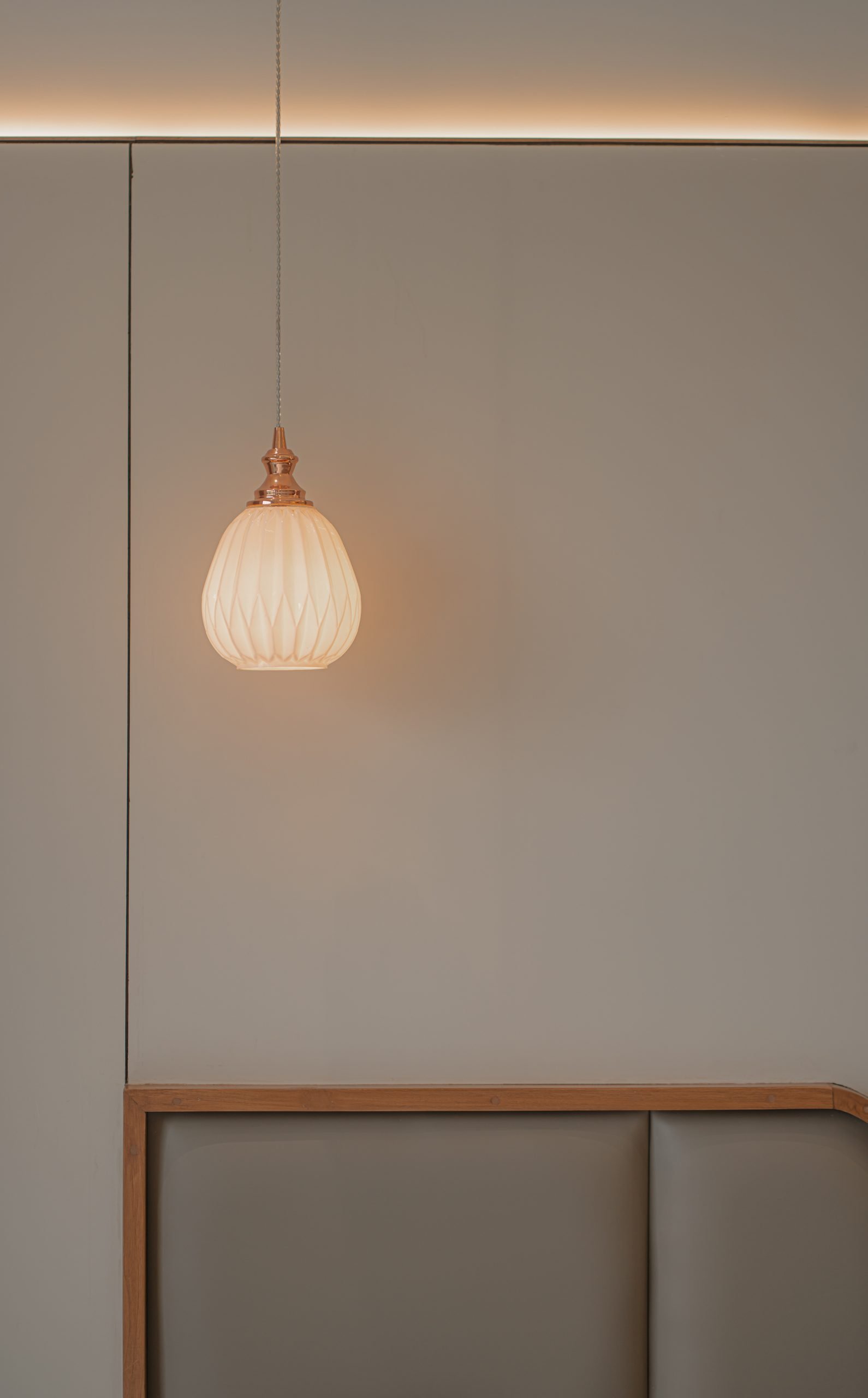 Pendant light detail, Jayendra Bhai Residence by Himanshu Raval Architects