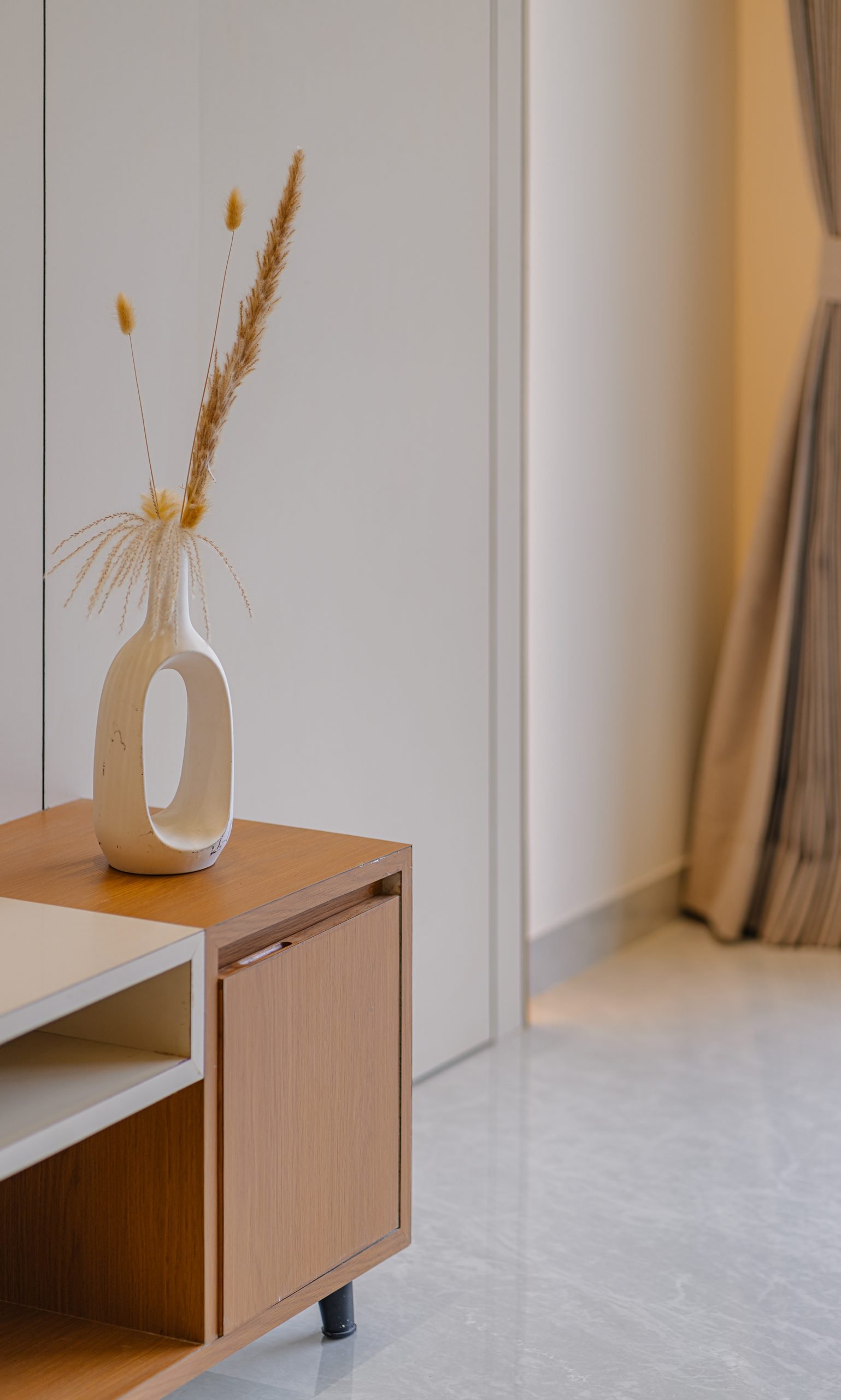 Bedside unit with vase, Jayendra Bhai Residence by Himanshu Raval Architects